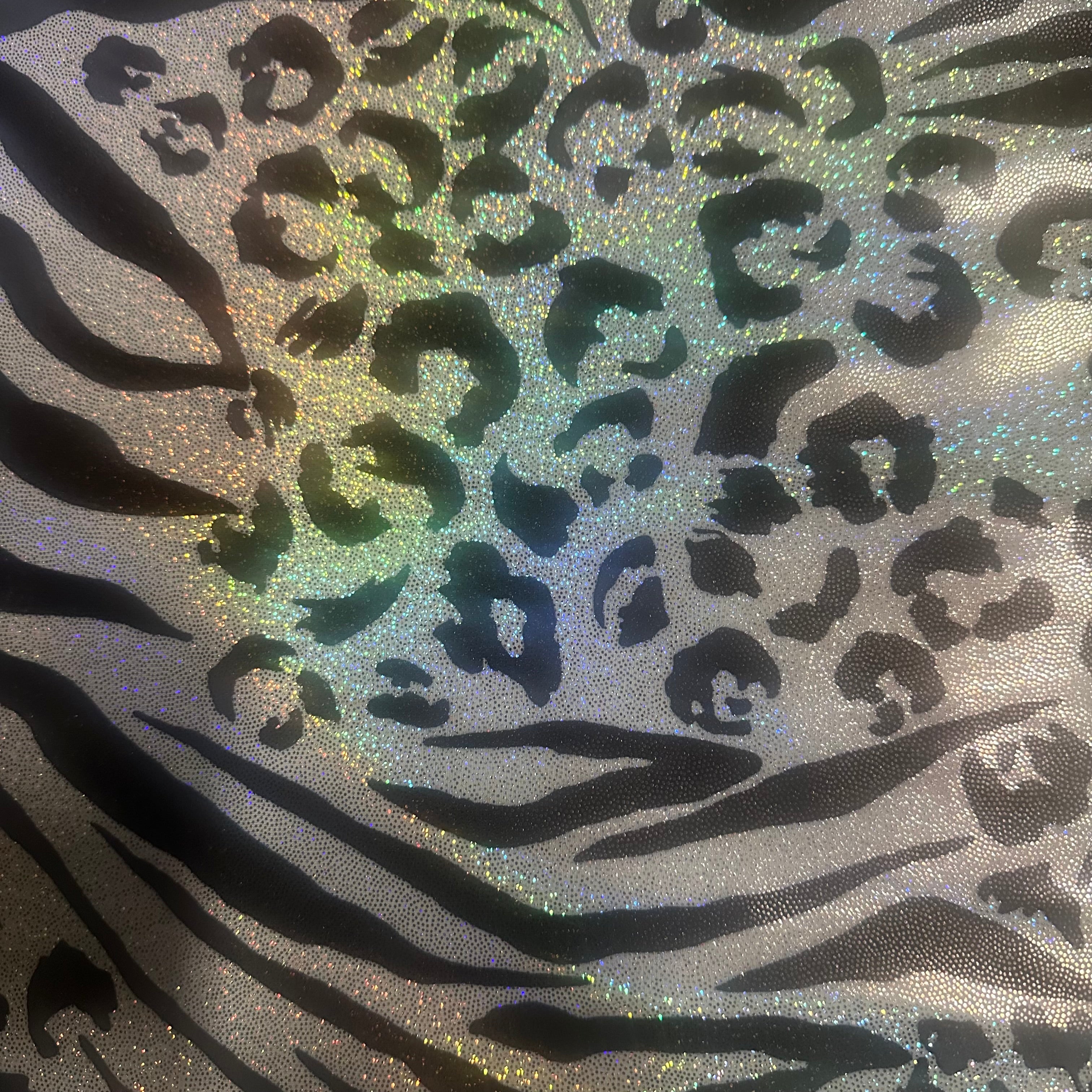 Animal Print Hologram Stretch Tricot Fabric | Spandex Palace. Black White Silver